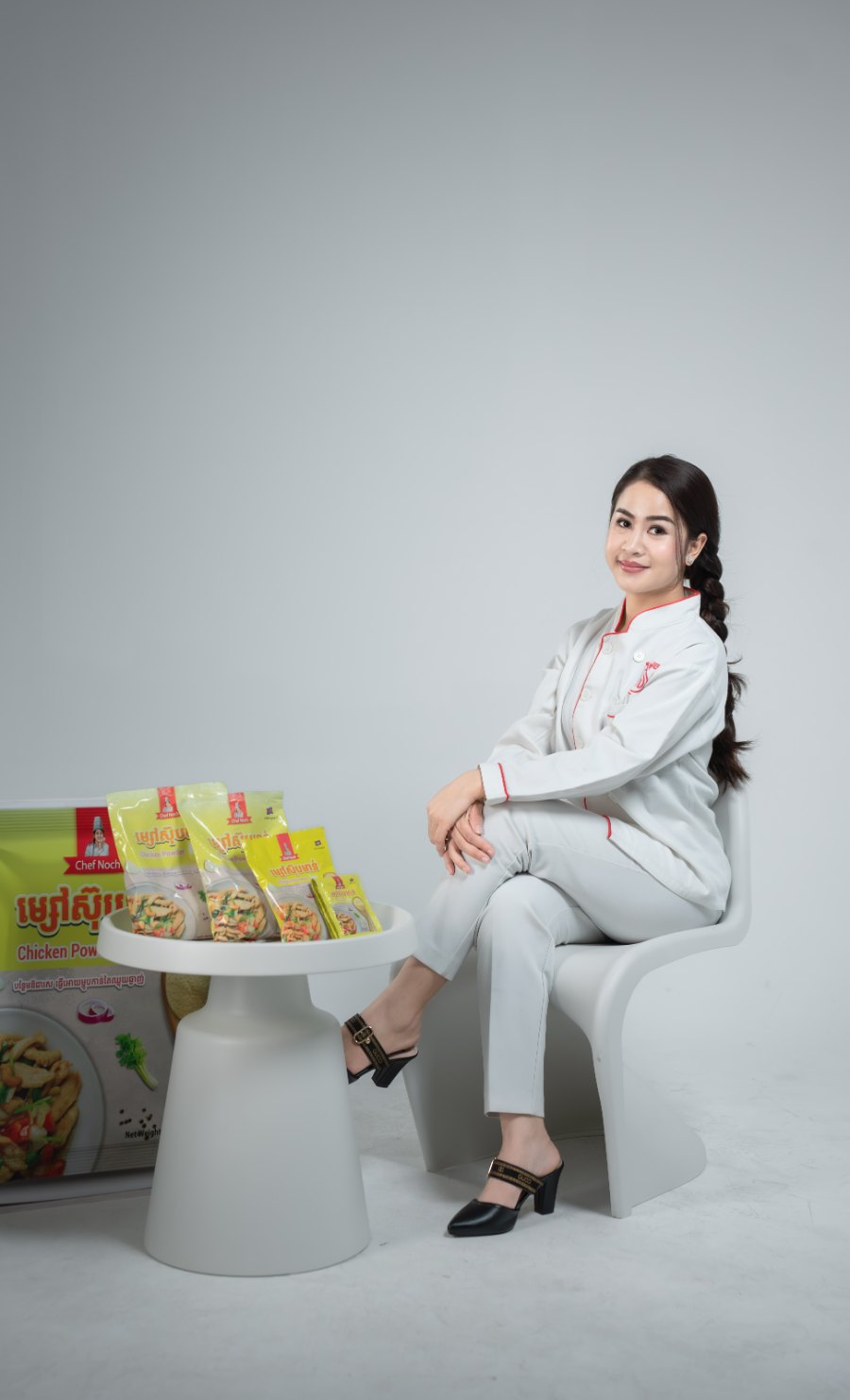 Pich Sreinuch, founder of Chef Noch, with the Chef Noch product range